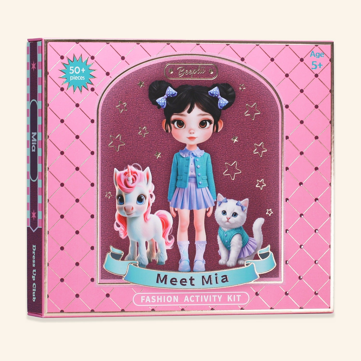 Meet Mia kit. Pink keepsake box with Mia, her pink-mane unicorn, and a white kitten framed in the gold window, on a cream-to-plum atmospheric backdrop